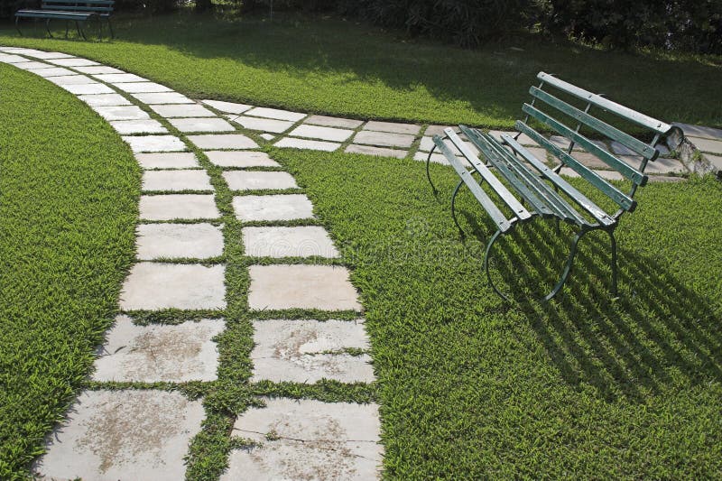 Lawn chairs on green grass stock image. Image of chair 1399241