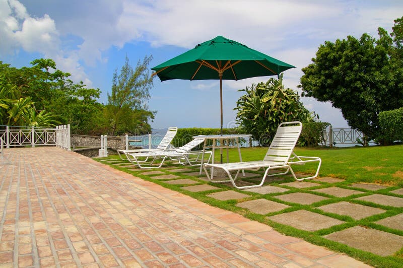 Lawnchairs By Poolside Picture. Image 9353065