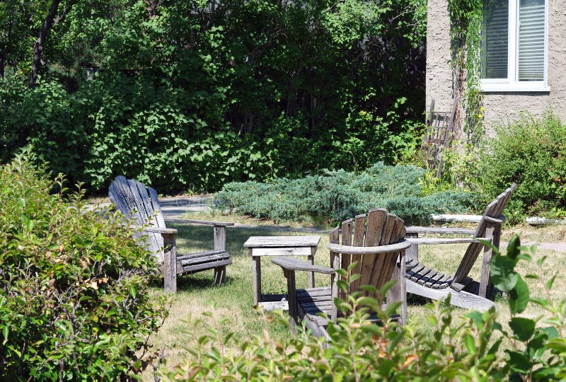 Lawn chairs in yard stock image. Image of grass, empty 97384299