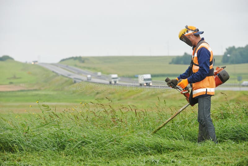Lawn mower worker stock photos