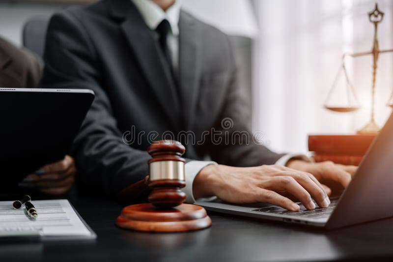 Lawyer Office. Gavel Of Justice With Scales And Lawyer Working On A ...