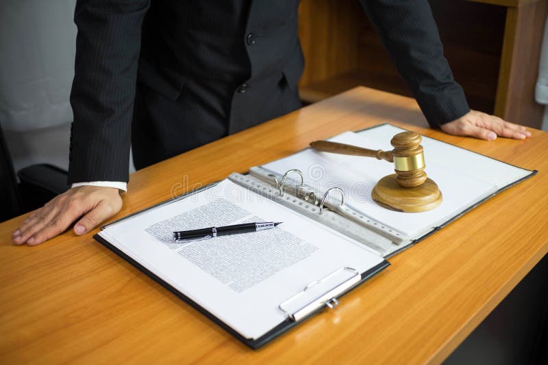 Lawyer working on the table in office. consultant lawyer, attorney, court judge, concept royalty free stock image Lawyer working on the table in office. consultant lawyer, attorney, court judge, concept royalty free stock image