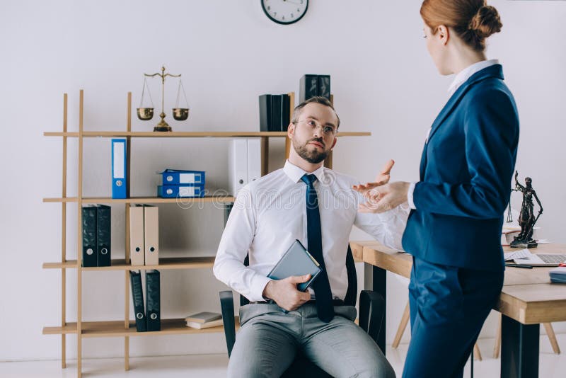 Lawyers Discussing Work Together at Workplace Stock Image Image of