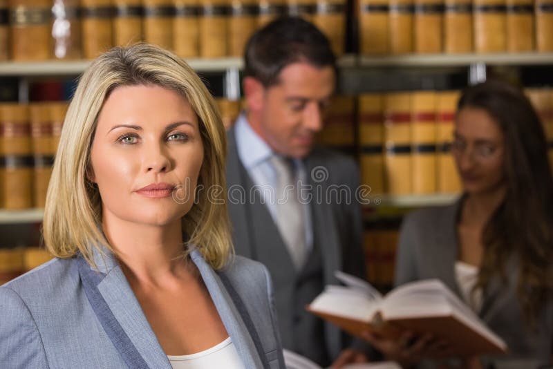 Lawyers in the law library stock image. Image of shelf 48945047
