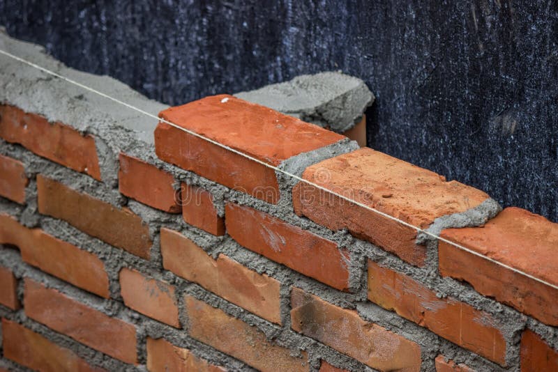 Lay Brick Wall, building brick wall. Selective focus.