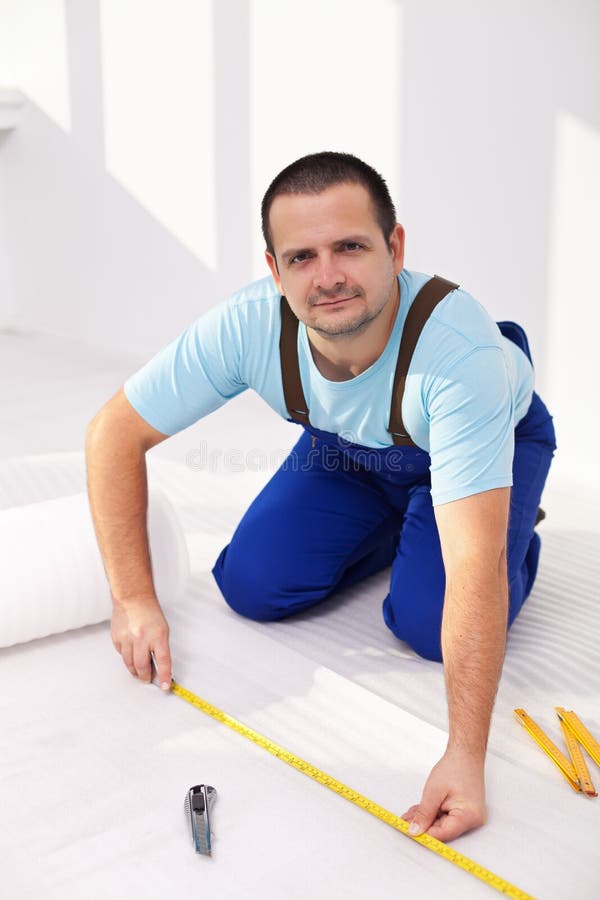 Laying the flooring at home stock photos Laying the flooring at home stock photos