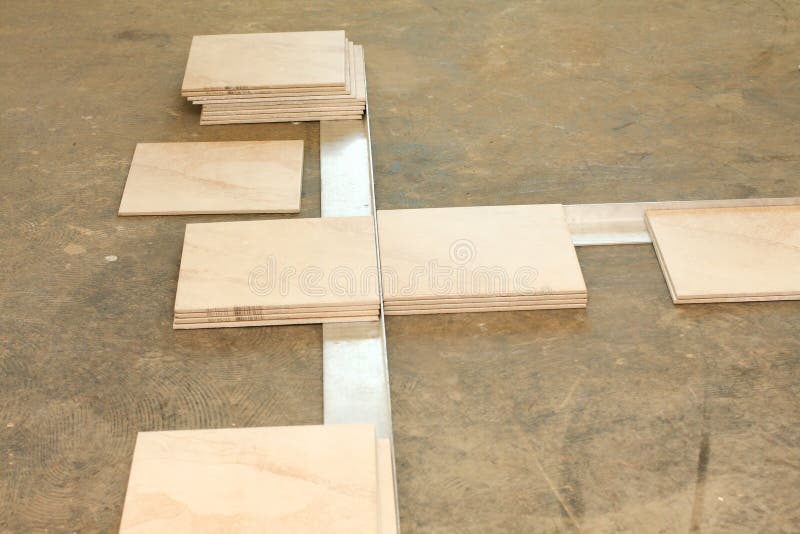 Laying Out Ceramic Tile Flooring Stock Image Image of arrangement
