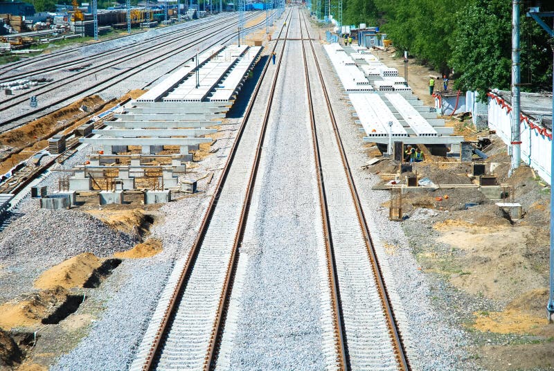 Laying railroad tracks stock image. Image of train, steel 66740865