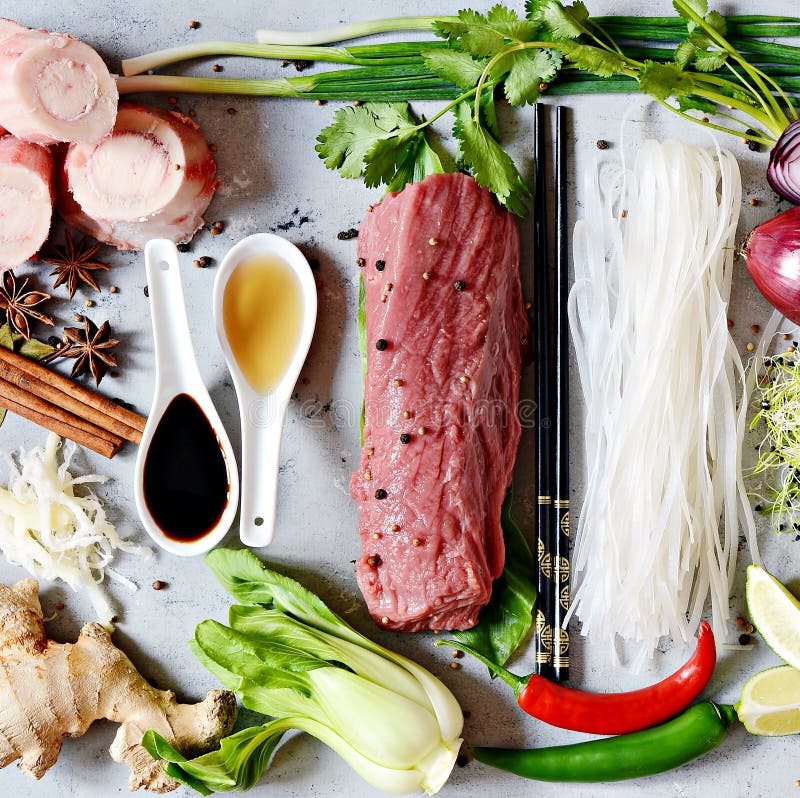 Layout of products on Vietnamese Pho Bo soup on gray background. stock photo.