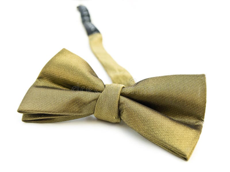 Gold bow tie isolated against white. View my full portfolio for similar images. Gold bow tie isolated against white. View my full portfolio for similar images.