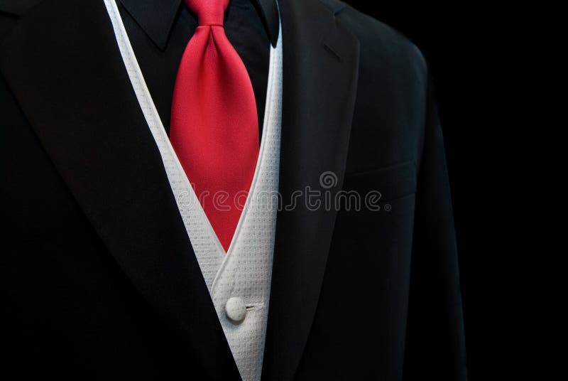 Red tie accenting a black tuxedo. Red tie accenting a black tuxedo.