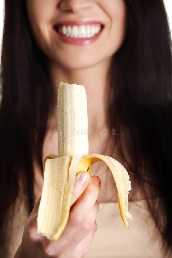 Le Beau Jeune Femme Mange La Banane Image Stock Image Du Fruits Nourriture 25433907