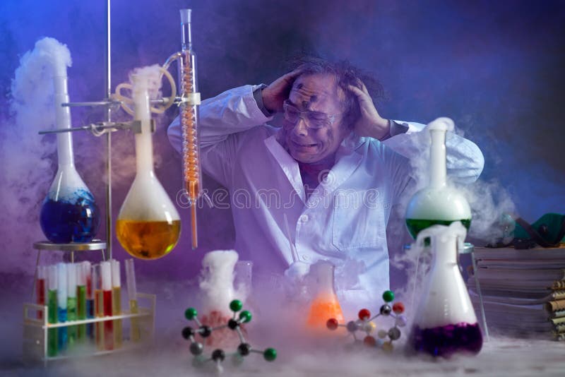 Disappointed chemist looking in his failed experiment in smoke of explosion. Disappointed chemist looking in his failed experiment in smoke of explosion