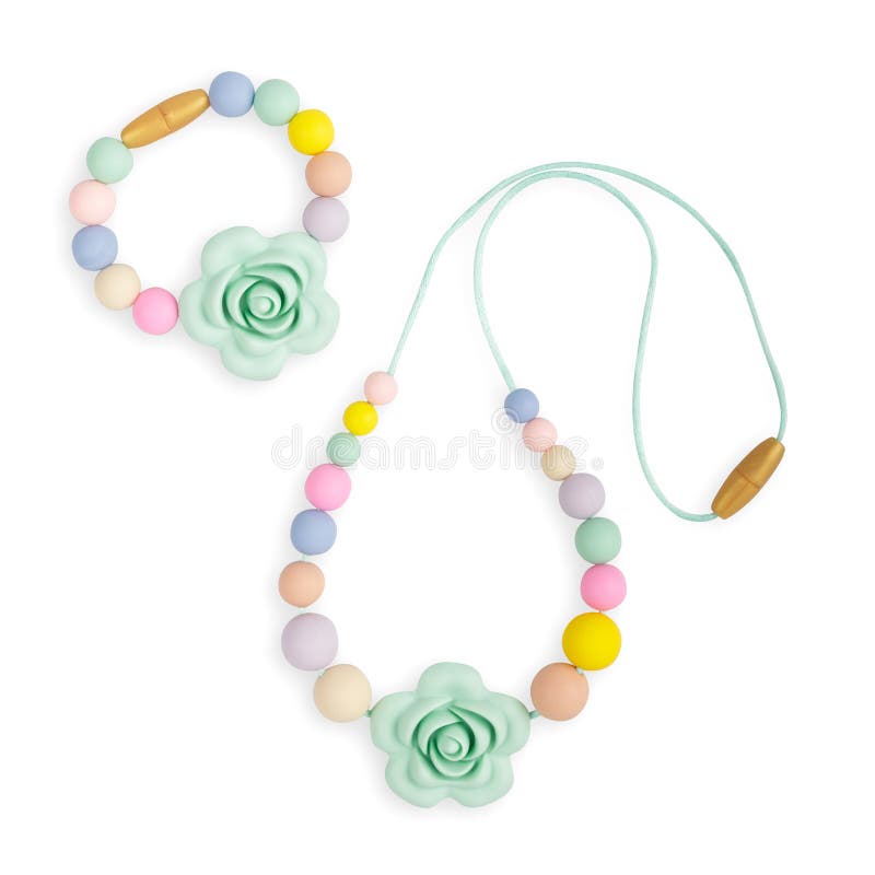 Le collier de dentition de bébé, le collier de mère de soins de perles et les enfants jouent photos stock Le collier de dentition de bébé, le collier de mère de soins de perles et les enfants jouent photos stock