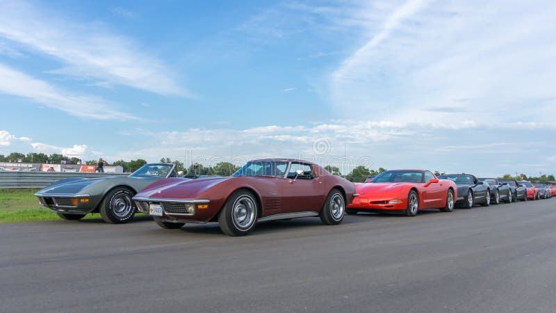 PONTIAC, MI/USA - AUGUST 17, 2016: `Corvettes on Woodward` show at the M1 Concourse, at the Woodward Dream Cruise. Woodward is a National Scenic Byway. PONTIAC, MI/USA - AUGUST 17, 2016: `Corvettes on Woodward` show at the M1 Concourse, at the Woodward Dream Cruise. Woodward is a National Scenic Byway.