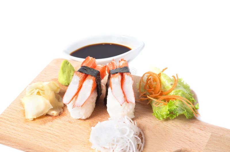 Le crabe colle le nigiri image libre de droits