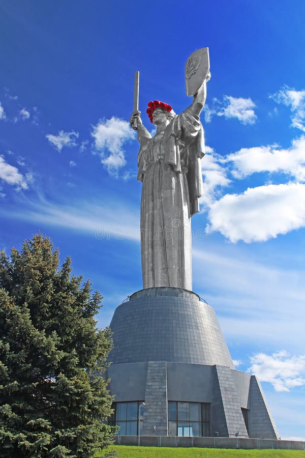 The monument `Mother Motherland` decorated with a wreath of poppies on the Day of Remembrance and Reconciliation in Kyiv, Ukraine. The monument `Mother Motherland` decorated with a wreath of poppies on the Day of Remembrance and Reconciliation in Kyiv, Ukraine