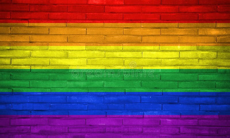 Le drapeau d'arc-en-ciel de droits civiques de LGBT a peint sur le mur de briques Copiez l'espace pour le texte ou le graphique photo libre de droits