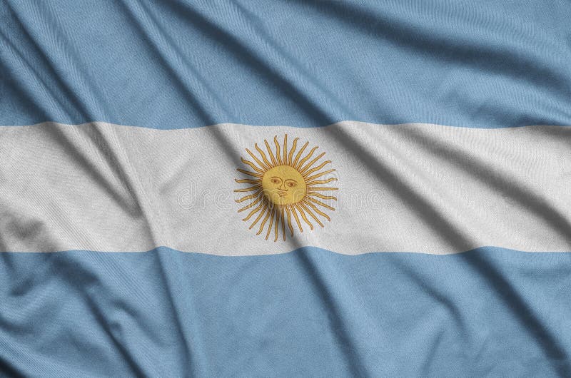 Le drapeau de l'Argentine est dépeint sur un tissu de tissu de sports avec beaucoup de plis Bannière d'équipe de sport images libres de droits Le drapeau de l'Argentine est dépeint sur un tissu de tissu de sports avec beaucoup de plis Bannière d'équipe de sport images libres de droits