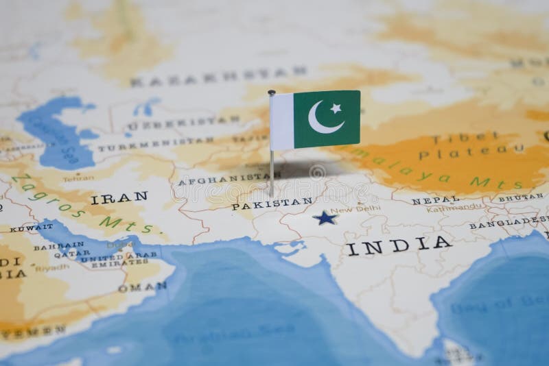 Le drapeau du Pakistan dans la carte du monde photo stock Le drapeau du Pakistan dans la carte du monde photo stock