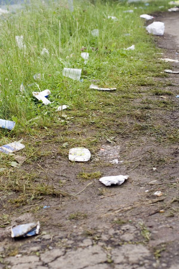 Lots of junk dumped on road and meadow. Lots of junk dumped on road and meadow