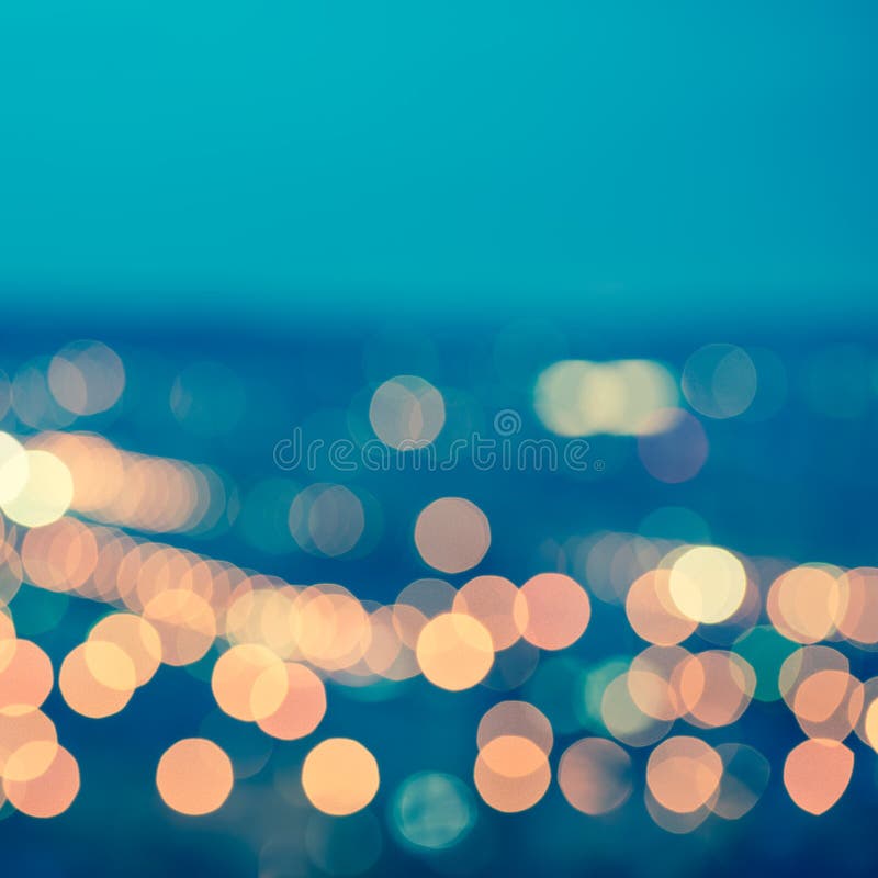 Le fond circulaire bleu abstrait de bokeh, ville s'allume avec le horizo image stock Le fond circulaire bleu abstrait de bokeh, ville s'allume avec le horizo image stock