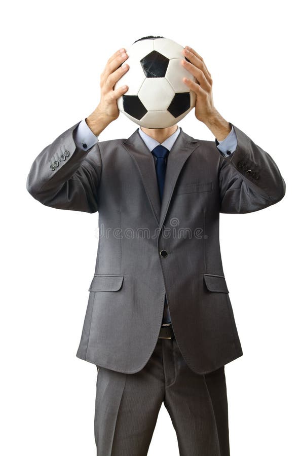 Le football de fixation d'homme d'affaires photographie stock libre de droits Le football de fixation d'homme d'affaires photographie stock libre de droits