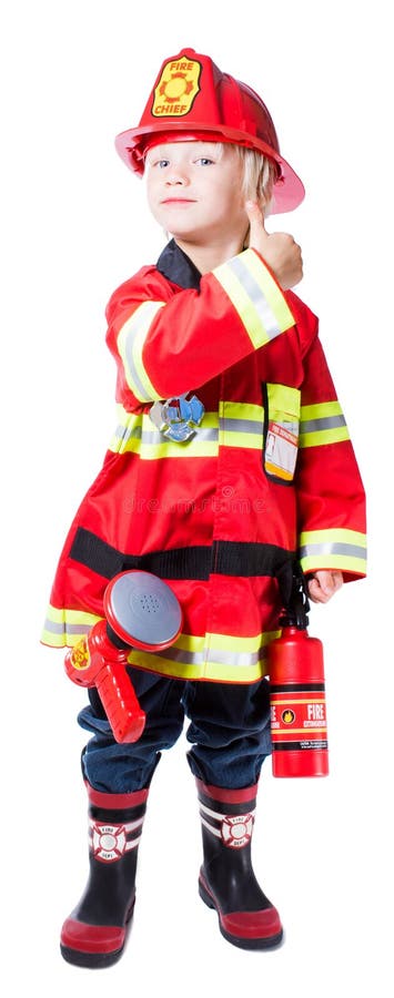 Four year old boy dressed as a fireman shows that all is well isolated on white background. Four year old boy dressed as a fireman shows that all is well isolated on white background