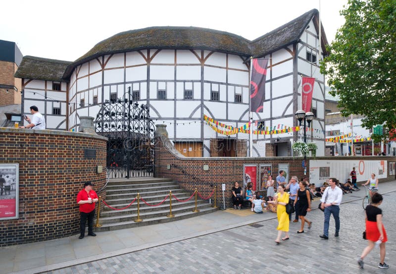 LONDON,UK - JULY 25,2019 :  The Globe Theatre in London, a faithful reproduction of the original venue where Shakespeare presented his plays, acting, ancient, architecture, arena, attraction, britain, british, building, capital, city, cultural, culture, destination, drama, elizabethan, england, english, europe, european, famous, great, historic, history, landmark, medieval, old, people, playwright, rebuilt, reconstructed, show, southbank, southwark, theater, tourism, tourist, traditional, travel, typical, united, kingdom, william, londonuk, 252019. LONDON,UK - JULY 25,2019 :  The Globe Theatre in London, a faithful reproduction of the original venue where Shakespeare presented his plays, acting, ancient, architecture, arena, attraction, britain, british, building, capital, city, cultural, culture, destination, drama, elizabethan, england, english, europe, european, famous, great, historic, history, landmark, medieval, old, people, playwright, rebuilt, reconstructed, show, southbank, southwark, theater, tourism, tourist, traditional, travel, typical, united, kingdom, william, londonuk, 252019