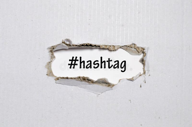Le hashtag de mot apparaissant derrière le papier déchiré image libre de droits Le hashtag de mot apparaissant derrière le papier déchiré image libre de droits