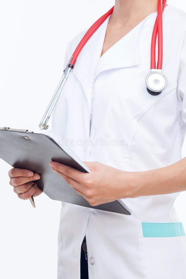 Le jeune docteur féminin professionnel travaille dur photos stock Le jeune docteur féminin professionnel travaille dur photos stock