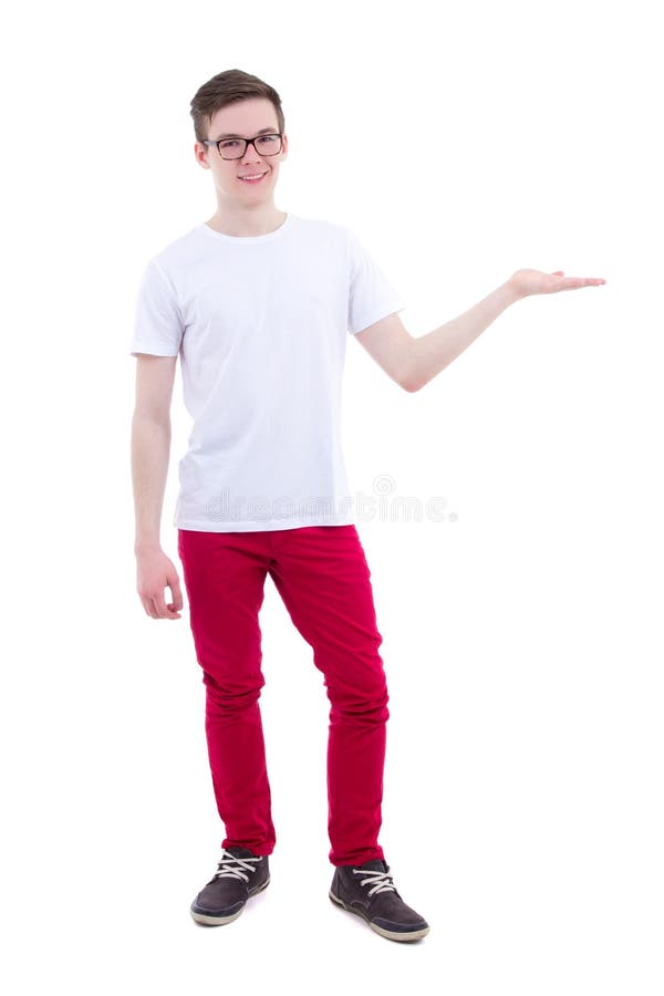 Le jeune homme bel dans le T-shirt blanc jugeant quelque chose disponible est photographie stock Le jeune homme bel dans le T-shirt blanc jugeant quelque chose disponible est photographie stock