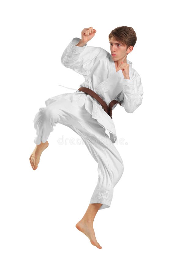 Le jeune karatek de type avec la ceinture brune sur le blanc a isolé le fond image libre de droits Le jeune karatek de type avec la ceinture brune sur le blanc a isolé le fond image libre de droits