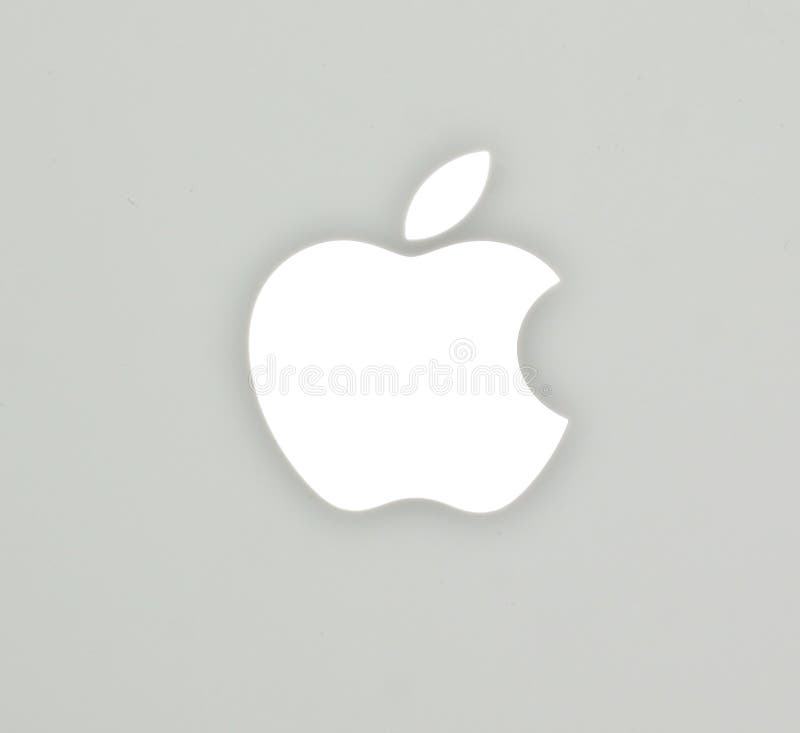 Le logo d'Apple sur le cahier de blanc de livre de Mac