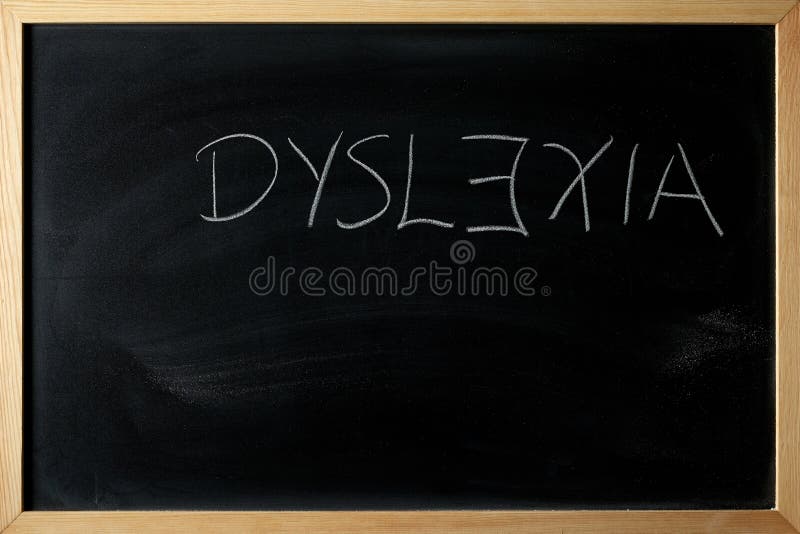 Le mot de dyslexie est écrit sur un tableau noir photographie stock Le mot de dyslexie est écrit sur un tableau noir photographie stock