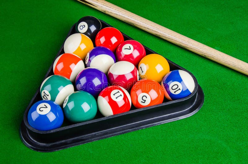 Billiard balls on green table with billiard cue, Snooker, Pool game. Billiard balls on green table with billiard cue, Snooker, Pool game.