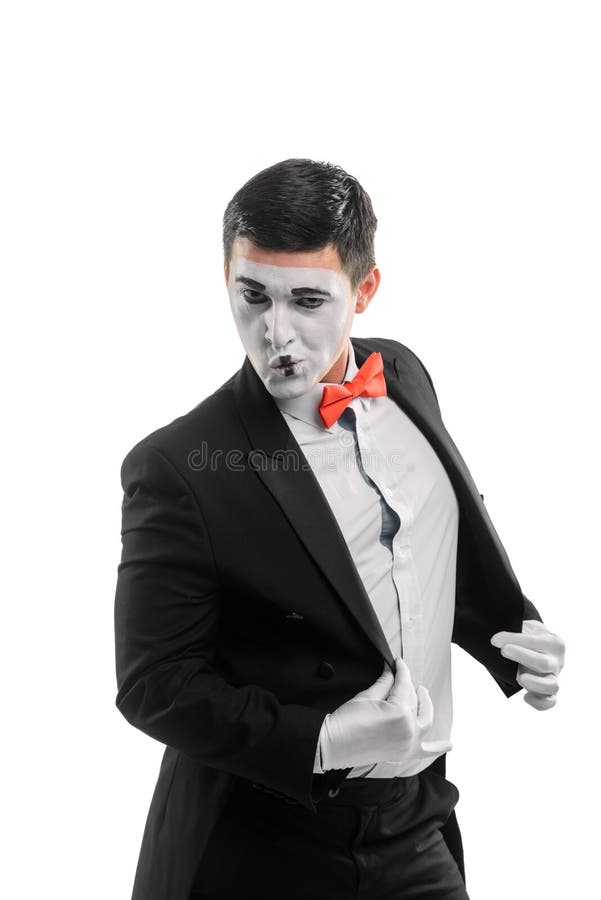 Le pantomime masculin redresse sa veste photos libres de droits Le pantomime masculin redresse sa veste photos libres de droits