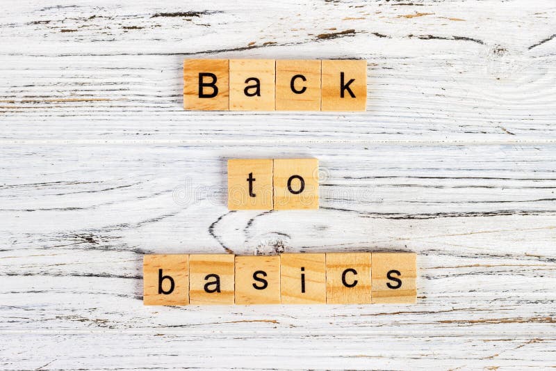 The words back to basics made of letters on wooden blocks. back to basics - fundamental principles concept. The words back to basics made of letters on wooden blocks. back to basics - fundamental principles concept.