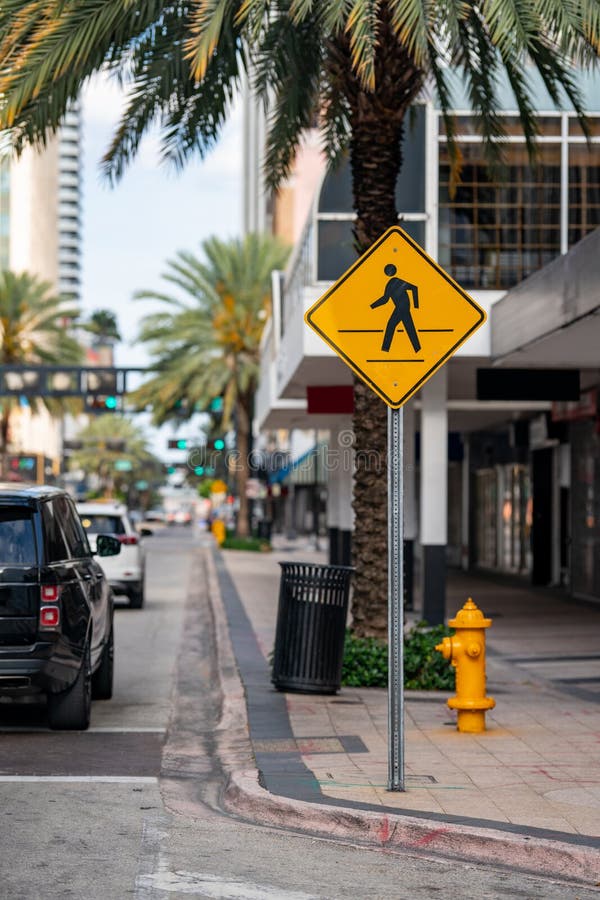 Crosswalk sign in the city USA. Crosswalk sign in the city USA