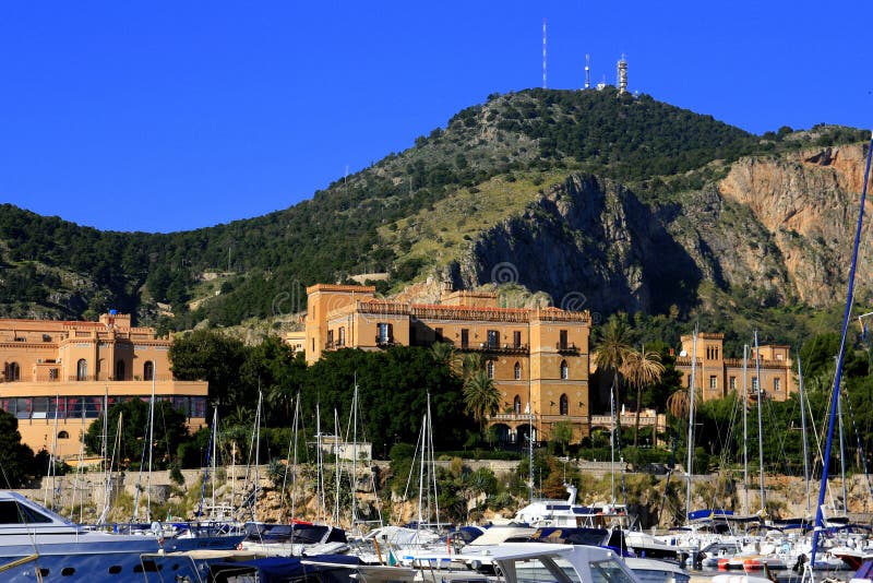 Palermo's Small Port, and quarter. Villa Igiea, Sailing boats & Mount Pelegrino. The Grand Hotel Villa Igiea is one of the most famous in Italy, projected in 1908 by Ernesto Basile, one of the greatest exponents of the Liberty style. Palermo's Small Port, and quarter. Villa Igiea, Sailing boats & Mount Pelegrino. The Grand Hotel Villa Igiea is one of the most famous in Italy, projected in 1908 by Ernesto Basile, one of the greatest exponents of the Liberty style.