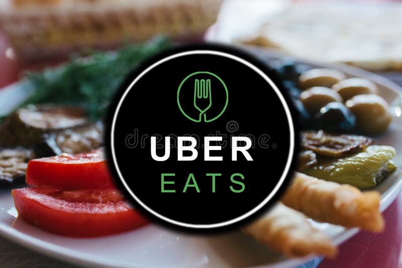 Le Portugal, Lisbonne, le 16 juin 2018 : l'UBER mange le logo Une entreprise populaire pour la livraison de la nourriture à la ma images libres de droits Le Portugal, Lisbonne, le 16 juin 2018 : l'UBER mange le logo Une entreprise populaire pour la livraison de la nourriture à la ma images libres de droits