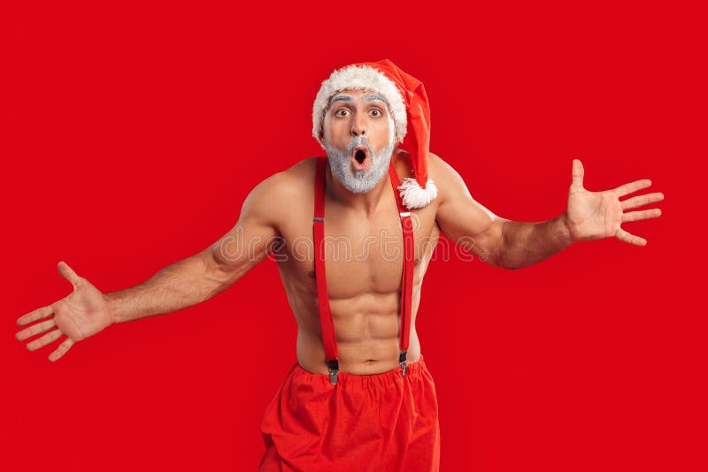 Le Père Noël Adulte Nu Regarde L