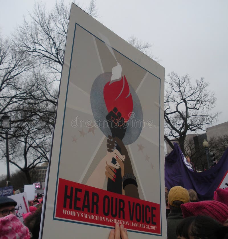 Women`s March on Washington, January 21, 2017: A record number of demonstrators descended on the nation`s capital to rally against the recently-inaugurated President of the United States, Donald Trump. This worldwide, grassroots movement was a series of political rallies organized for women`s rights as well as a myriad of other causes threatened by President Donald Trump`s rhetoric. Here, a poster with the words, `Hear Our Voice`. Women`s March on Washington, January 21, 2017: A record number of demonstrators descended on the nation`s capital to rally against the recently-inaugurated President of the United States, Donald Trump. This worldwide, grassroots movement was a series of political rallies organized for women`s rights as well as a myriad of other causes threatened by President Donald Trump`s rhetoric. Here, a poster with the words, `Hear Our Voice`.