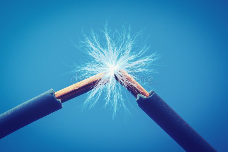 electrical wires sparks on blue background. close up. electrical wires sparks on blue background. close up