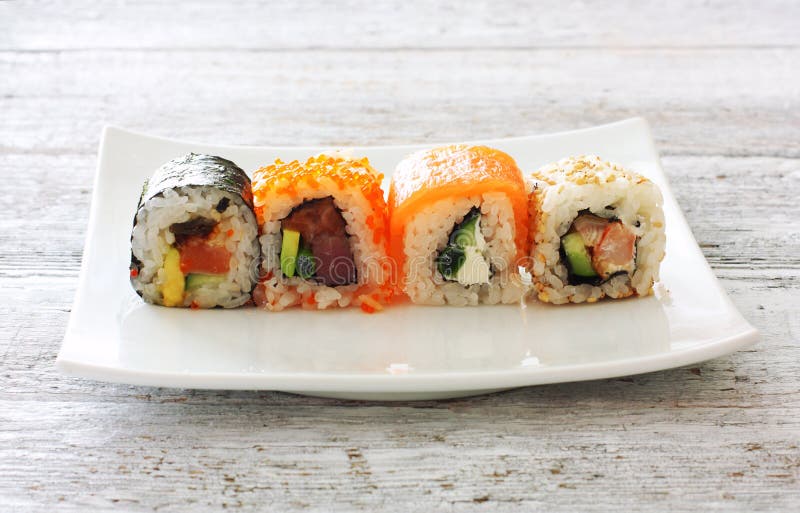 Le sushi rapièce la collection photos stock Le sushi rapièce la collection photos stock