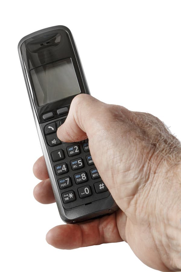 Le téléphone sans fil noir dans une main image stock Le téléphone sans fil noir dans une main image stock