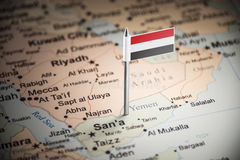 Le Yéménite a identifié par un drapeau sur la carte photographie stock libre de droits Le Yéménite a identifié par un drapeau sur la carte photographie stock libre de droits