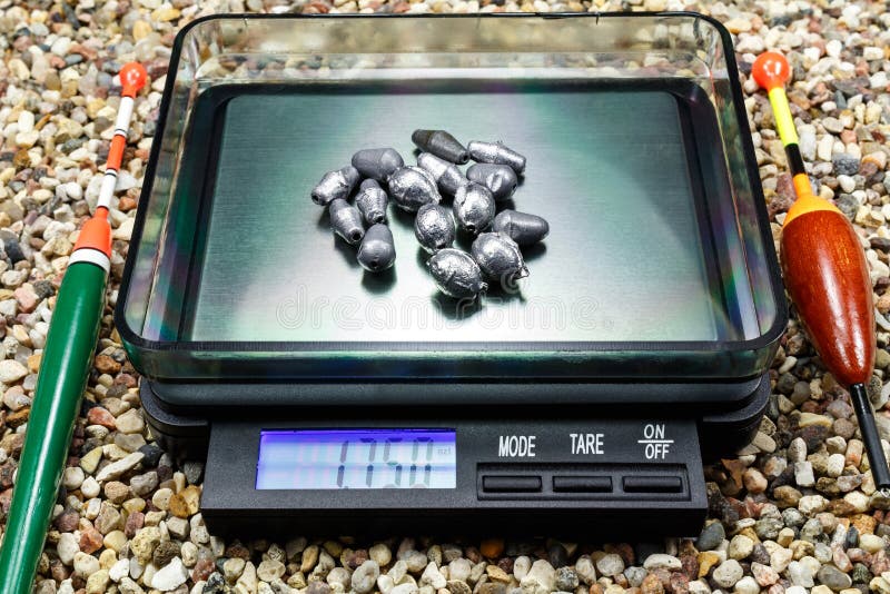 Fishing Weights stock photo. Image of heavy, gold, fish 96024