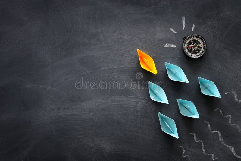 Leadership Banner Concept with Paper Boat on Blackboard Background. One  Leader Ship Leads Others Stock Image - Image of abstract, economy: 185856421