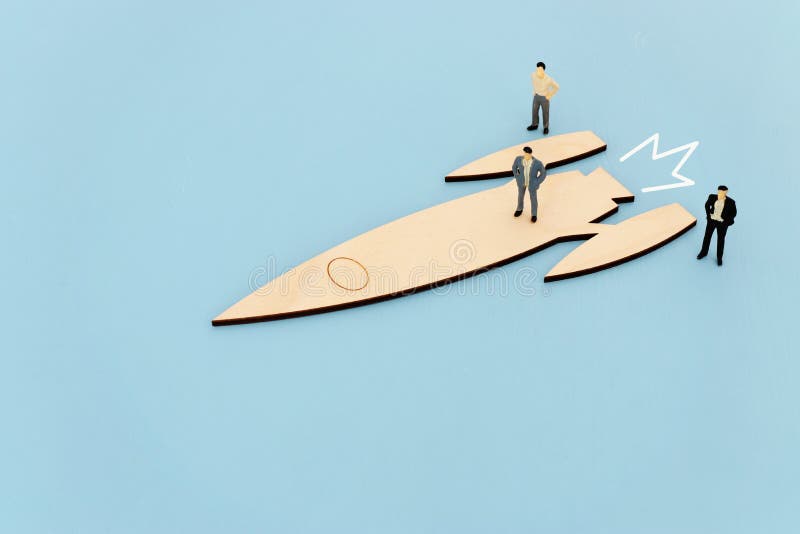 Leadership and teamwork concept miniature people and rocket, inspiration and vision. royalty free stock photos
